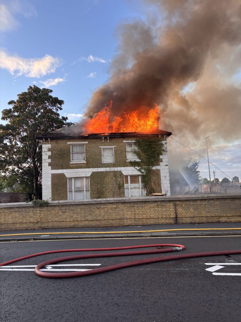 Image of house on fire